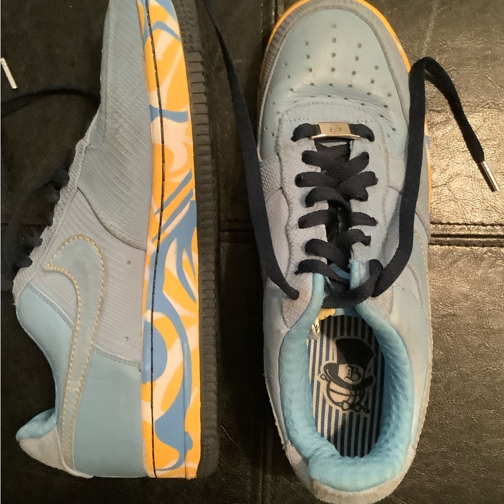Nike light blue with decorative sole.Size US 8.